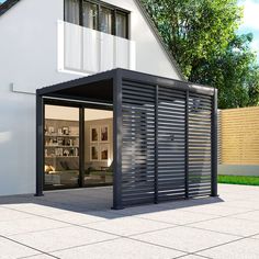 an open garage with sliding doors on the outside