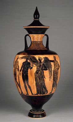 an ancient vase with figures painted on it