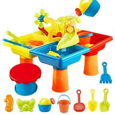 a play set with toys like sand, water and spoons on the table for children to play in