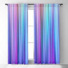 an open window with colorful curtains hanging on the side