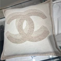 Chanel Merino Wool Cashmere Cc Pillow Ivory Beige Brand New In Dustbag It Comes With Dustbag, Ribbon And Tag Original Receipt Anything Over $500 Will Be Authenticated By Poshmark Any Questions Feel Free To Dm Me Gisy15 Questions? Leave A Comment Below! Chanel Pillow, Chanel Design, Beige Color, Dm Me, Merino Wool, Dust Bag, Cashmere, Chanel, Ribbon