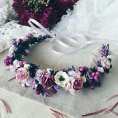 a flower crown is laying on a table