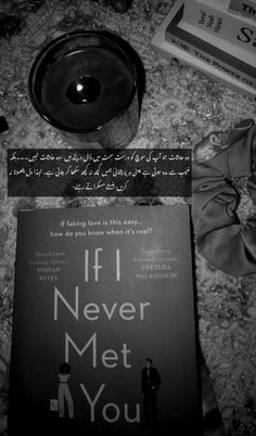 a book sitting on top of a table next to a bowl