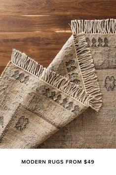 two rugs with fringed ends on top of each other and the words modern rugs from $ 39