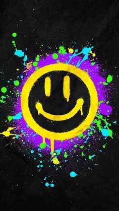 a smiley face painted in yellow and purple