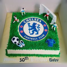 a birthday cake decorated with soccer players and the name chelsea football club on it's field