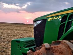 a tractor is parked in the middle of a field