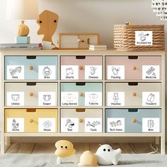 an organized toy chest with drawers and toys