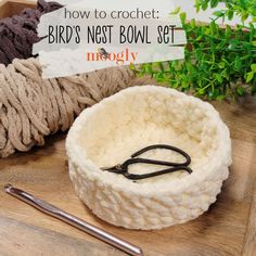 a crochet bird's nest bowl set with scissors