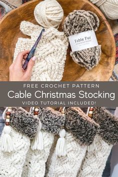 the crochet pattern for cable christmas stockings is shown on a wooden platter