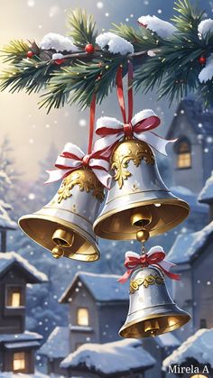 three bells hanging from a christmas tree in front of snow covered houses and evergreens