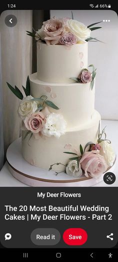 a white wedding cake with pink flowers on top and the words my dear flowers above it