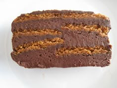 a piece of chocolate cake on a white plate