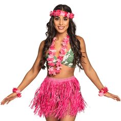 a woman in a pink hula skirt and flower leis posing for the camera