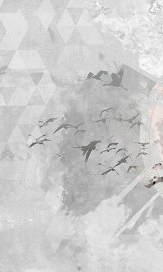 birds flying in the sky over an abstract background