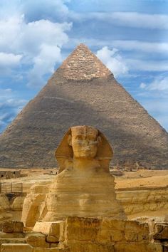 the great sphinx in front of the pyramid