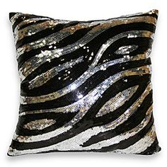 a black and silver pillow with sequins on it