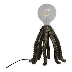 an octopus lamp on a white background