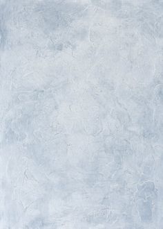 an abstract background with white and blue hues in the center, including snow flakes