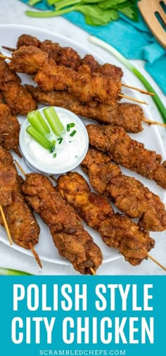 polish style chicken skewers on a white plate with ranch dip and celery