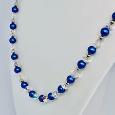 All Swarovski Beads . Sapphire Blue Pearls Crystal Ab Beads And Finished With A Sterling Silver Lobster Clasp . Brand New Blue Beaded Chain Jewelry For Wedding, Elegant Blue Crystal Necklaces With Round Beads, Elegant Blue Crystal Necklace With Round Beads, Blue Crystal Beaded Necklaces For Jewelry Making, Blue Beaded Crystal Necklace, Blue Single Strand Beaded Necklace For Wedding, Blue Single Strand Wedding Necklace, Blue Crystal Necklaces With Faceted Beads, Blue Crystal Necklace With Faceted Beads