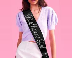 "✨HBD: Our black satin + rhinestone \"Birthday Girl\" sash is the party addition you've been looking for + a guaranteed hit! ✨Silky Smooth: our black satin sash was made for second glances. With a softer-than-soft silk base and shiny rhinestone lettering, this sash is sure to get you noticed on your big day! ✨Shine Bright: one size fits all! Our sash is 3\" wide and 70\" long total - perfect for each + every birthday queen! ✨Let's Party: We made this for any birthday girl to use on her big day - so whether you're celebrating your 21st birthday, your 30th birthday, or even just throwing an older wiser hotter theme bday party... our sash will look fab!  ✨Worry Free: don't fret if your sash comes with a few wrinkles! All of our sashes are 100% iron-friendly :) ✨Cute Stuff Inside: and outside, Pink Birthday Party Decorations, Bachelorette Party Sash, Gold Bachelorette Party, Gold Sash, Gold Bachelorette, Pink Sash, Bachelorette Sash, Birthday Sash, Girls Party Favors