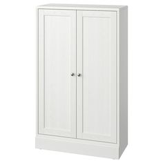 a white cabinet with two doors on the front