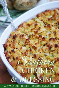 southern chicken and dressing in a casserole dish with a serving utensil