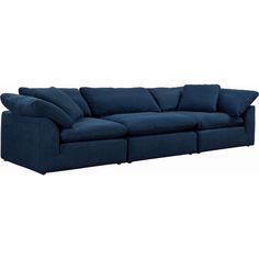 a large blue couch with pillows on the top and bottom ends, in front of a white background