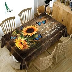 sunflowers and butterflies on wooden table with chairs