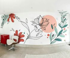 a room with flowers painted on the wall