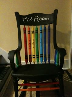 a chair with crayons painted on it that says, mrs ream