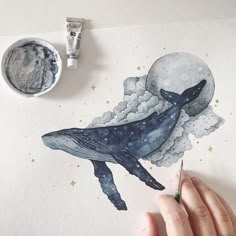 a drawing of a whale in the sky