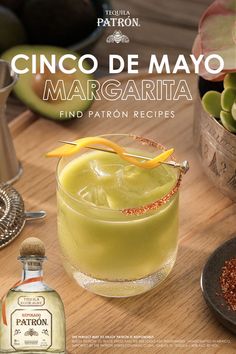 an advertisement for cinco de mayo margarita on a wooden table