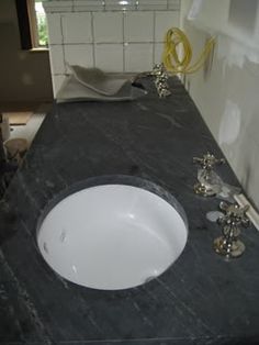 a bathroom counter with a sink in it