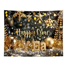 a happy new year banner with gold and silver decorations on it, surrounded by snowflakes