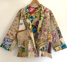 This Beautiful Patchwork Style Short jacket. Looks fabulous over a long silk tank dress or short pants or wear it with jeans & boots.Jacket it will give you a awesome look.Inside is lined with a statements cotton fabric to make it soft & warm.  Wear it open or close. Perfect for any Season. Coming with two Pockets.  Also nice idea for gift friends or family.  Each piece is made by hand,There is no any other are exactly same.  Fabric - Pure Silk with Inside Pure Cotton Reversible SIZE  (UK 18 up Silk Patchwork, Silk Tank Dress, Jeans Boots, Reversible Quilt, Silk Tank, Short Jacket, Tank Dress, Hand Stitched