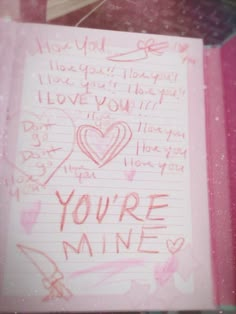 a note with writing on it that says, you're mine i love you