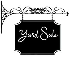 yard sale sign hanging from the side of a pole with an ornate design on it