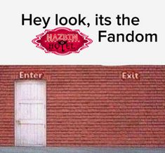 an advertisement on the side of a red brick building that says, hey look, it's the fandom