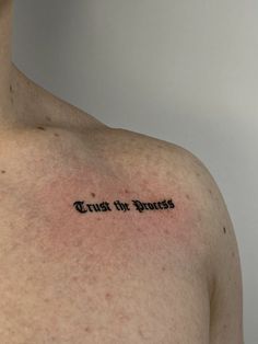 a man with a tattoo on his chest that says, don't touch my heart