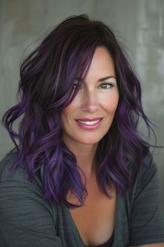 Midnight Purple hair is a mesmerizing choice for those daring to make a bold statement. See more options below. Purple Glaze Hair, Purple Toner On Brown Hair, Outfits For Purple Hair, Grayish Purple Hair, Brunette And Purple Hair, Purple Color Melt Hair, Purple Dark Hair, Dark Hair With Purple Highlights, Purple Halo Hair