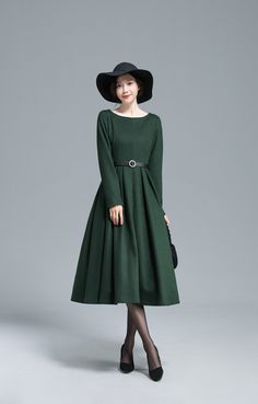 "Stay cozy in this green wool dress from Xiaolizi. The pleated dress made from a super soft wool in a fit and flare construction. The evening dress topped with a boat collar. The winter party dress finished with long sleeves. Details: * More colors https://etsy.me/3Egy6rJ * 35% wool blend, 35% fiber and polyester, 30% nylon * Polyester lining * Two seam pockets * Boat collar * Long sleeves * Regular fit * back zipper * pleated dress * Dry clean * The model is 170cm (5′7″) tall with a 80cm (31.5\ Winter Pleated Dress For Work, Winter Pleated Long Sleeve Midi Dress, Pleated Long Sleeve Midi Dress For Winter, Long Sleeve Pleated Midi Dress For Winter, Fall A-line Midi Dress With Pleated Hem, Green Winter Workwear Dress, Green A-line Winter Dress, Winter Fit And Flare A-line Midi Dress, Green Midi Dress For Winter