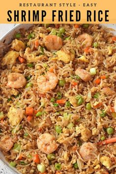 shrimp fried rice with peas and carrots in a pan