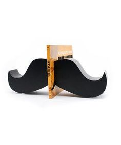 a bookend with a black mustache on it