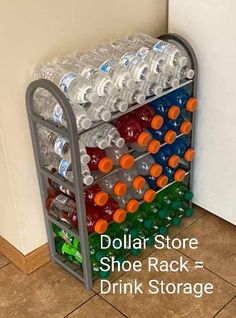 a rack filled with lots of water bottles next to a white wall and tile floor