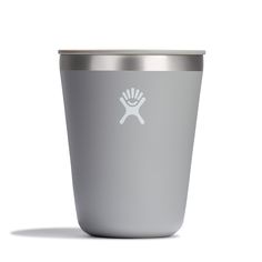 a stainless steel tumbler with a white logo on it