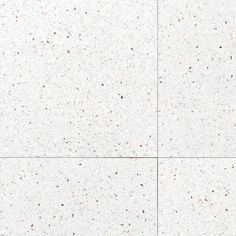 an image of white and brown speckled tiles