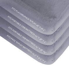 five mattresses stacked on top of each other in different sizes and colors, with the names