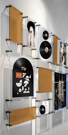 a wall with various records on it